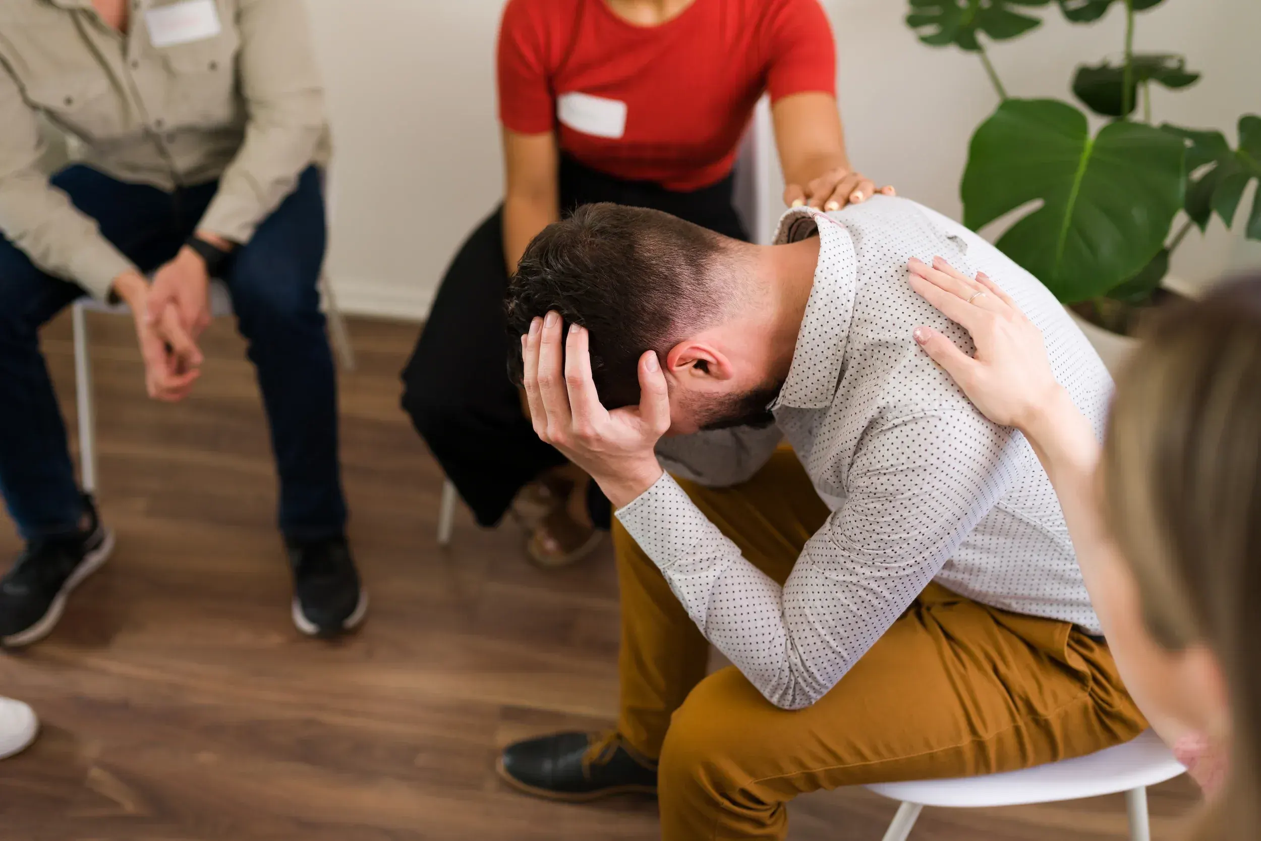 Person recognizing PTSD symptoms and seeking help at Refresh TMS Weston